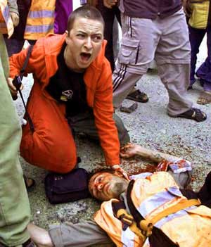 Hurndall lies shot on ground