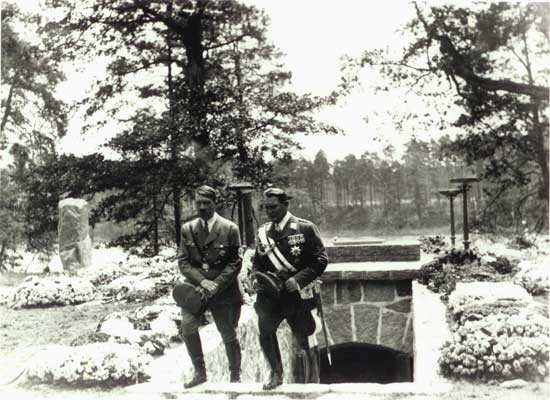 Staff greet Hitler, G&ouml;ring, emerging from Carin's new crypt at Carinhall, June 1934