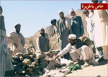 Afghan villagers pick over rubble of homes after US air attack