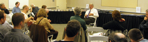 Michael Santomauro deliberately conceals his face