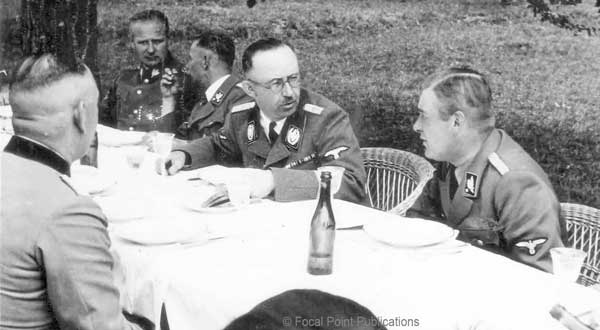 Heinrich Himmler, center, visiting Lublin and conferring with SS Gruppenf&uuml;hrer Odilo Globocnik