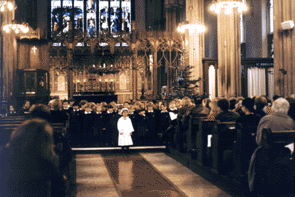 Jessica (far right, peeping, with paper